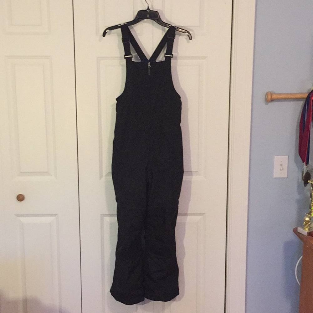 Lands’ End snow pants.  Boys size 12